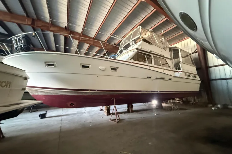 Slide: The Image of 1984 Viking 44 Motor Yacht in storage, showcasing classic design and structure. - 5