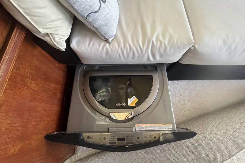 Slide: The Image of LG washing machine under seat in 1981 Ocean Alexander 50 Pilothouse yacht. - 11