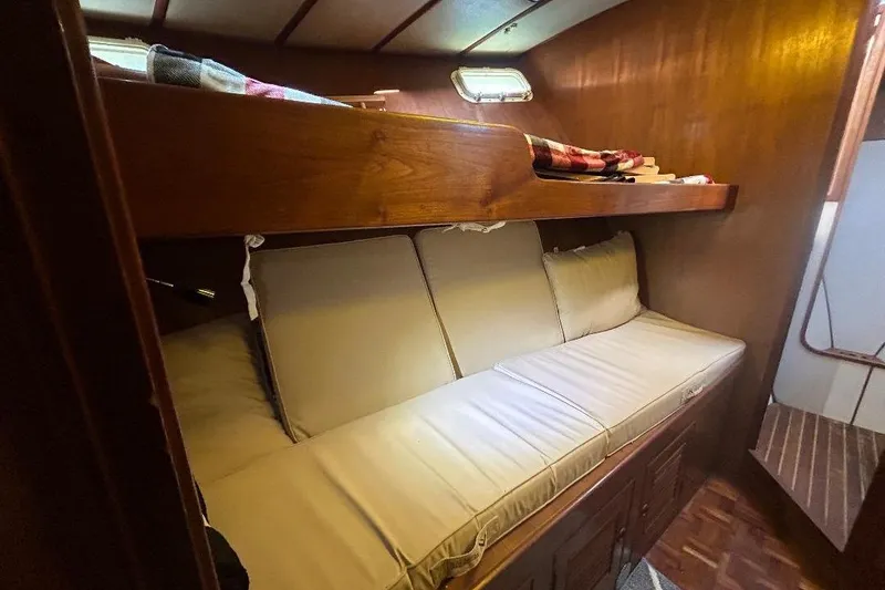 Slide: The Image of Cozy cabin interior of 1981 Ocean Alexander 50 Pilothouse with bunk beds and wooden finish. - 20