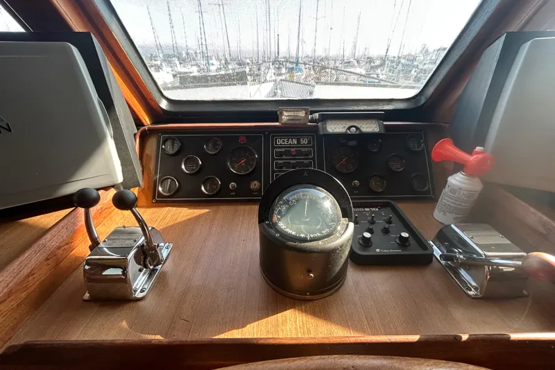 Slide: The Image of Cockpit of 1981 Ocean Alexander 50 Pilothouse with navigation instruments and controls. - 29