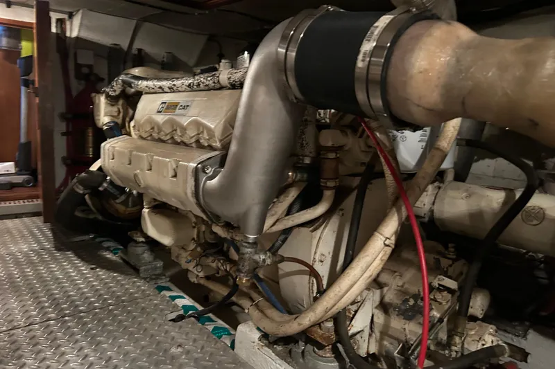 Slide: The Image of Engine room of 1981 Ocean Alexander 50 Pilothouse with Caterpillar engine. - 35