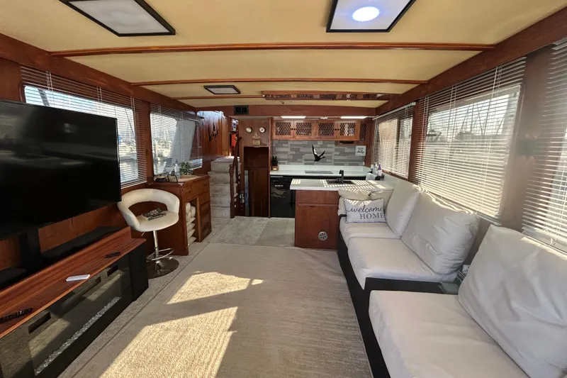 Slide: The Image of Luxurious interior of 1981 Ocean Alexander 50 Pilothouse yacht with modern amenities. - 4