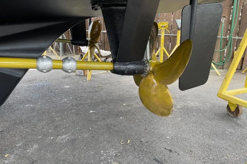 Slide: The Image of Propeller and rudder of 1981 Ocean Alexander 50 Pilothouse on dry dock. - 42