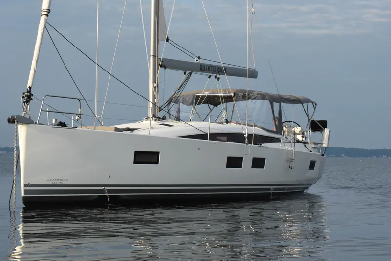 The Image of 2019 Jeanneau 51 yacht on calm water, showcasing sleek design and modern features. - 0