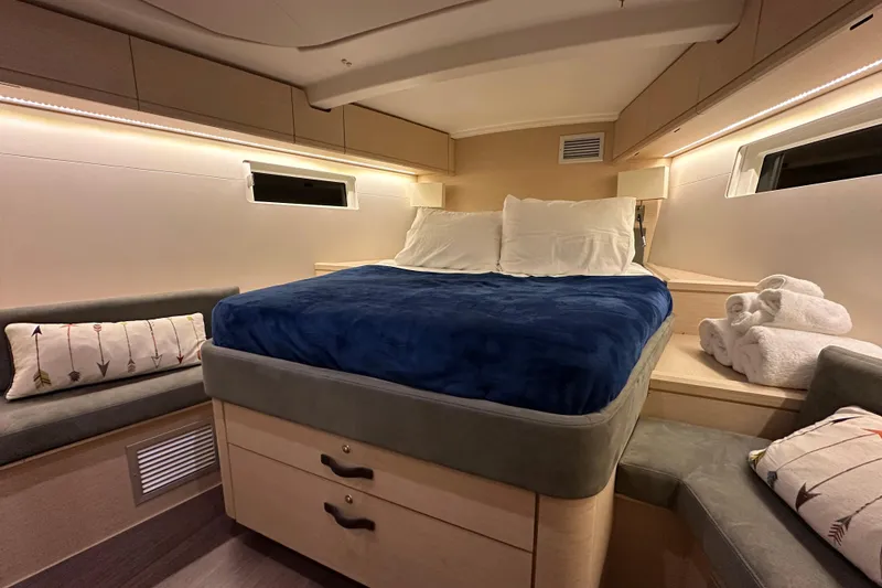 Slide: The Image of Luxurious cabin interior of 2019 Jeanneau 51 yacht with cozy bed and modern design. - 34