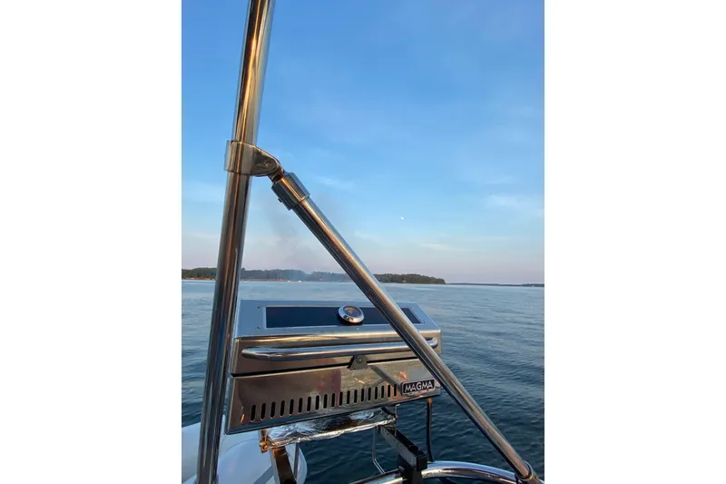 Slide: The Image of Jeanneau 51 sailboat with grill on calm waters, 2019 model. - 43