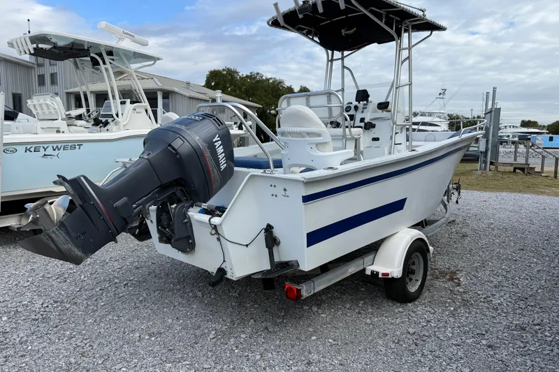 Slide: The Image of 1998 Cape Horn 19 CC boat with Yamaha outboard motor on a trailer. - 6