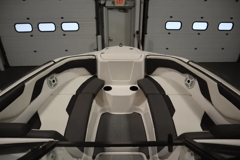 Slide: The Image of 2020 Yamaha Boats AR210 interior with sleek seating and modern design. - 10