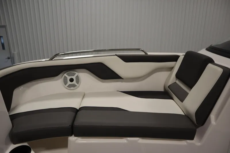 Slide: The Image of 2020 Yamaha AR210 boat interior with cushioned seating and speaker. - 15