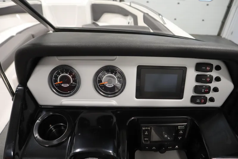 Slide: The Image of 2020 Yamaha AR210 boat dashboard with gauges, controls, and display screen. - 21
