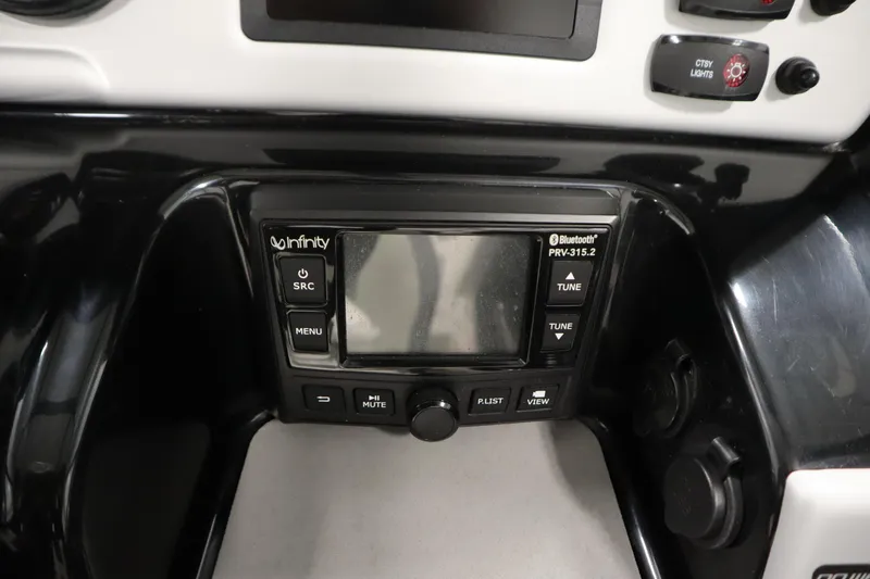 Slide: The Image of Yamaha AR210 2020 boat dashboard with Infinity Bluetooth stereo system. - 24