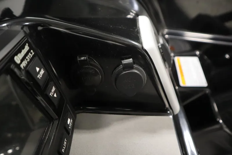 Slide: The Image of Control panel of 2020 Yamaha Boats AR210 with USB and auxiliary ports. - 25