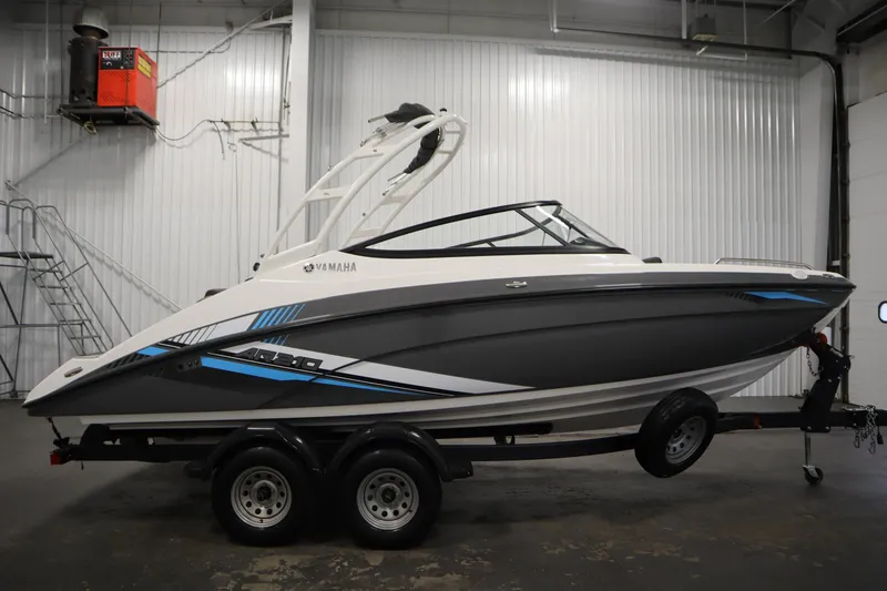 Slide: The Image of 2020 Yamaha Boats AR210 on trailer in indoor storage facility. - 3