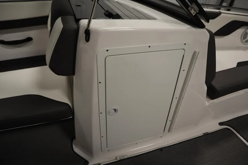 Slide: The Image of 2020 Yamaha AR210 boat interior with storage compartment and seating. - 33