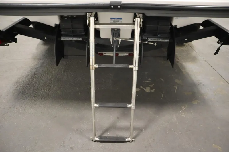 Slide: The Image of Rear view of 2020 Yamaha AR210 boat with extended swim ladder. - 45