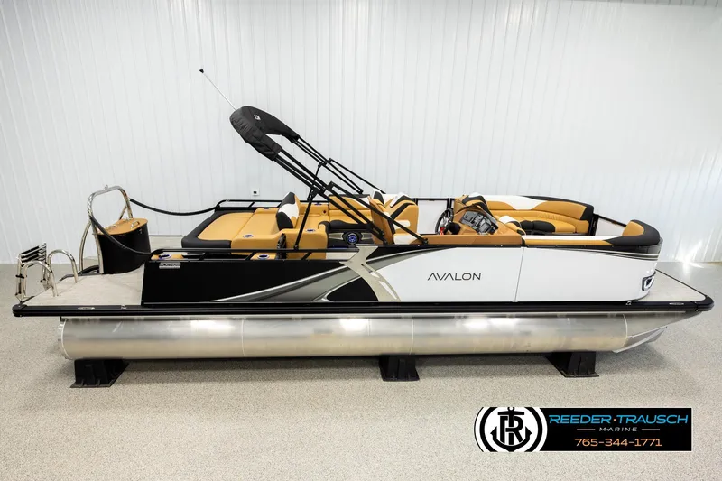 The Image of 2026 Avalon LSZ VRB pontoon boat with sleek design and luxurious seating. - 0