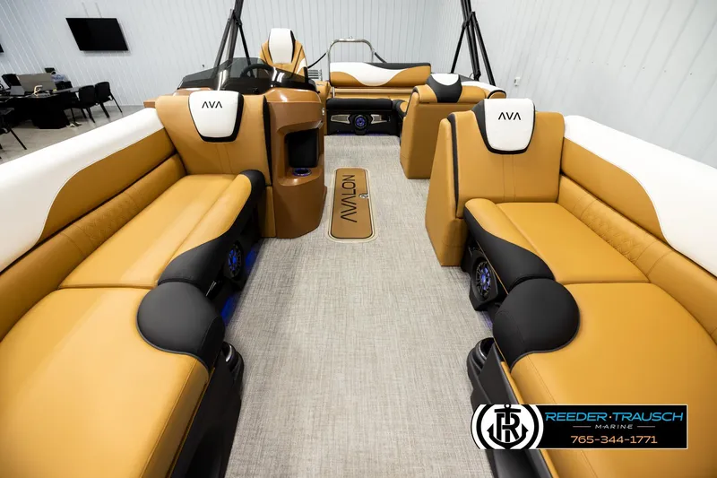 Slide: The Image of 2026 Avalon LSZ VRB boat interior with tan and black seating, modern design. - 13