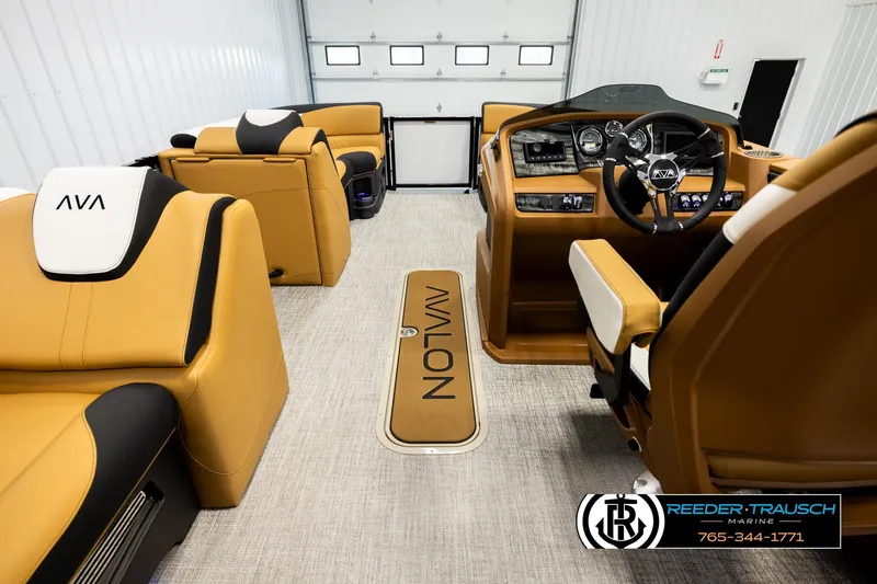 Slide: The Image of Luxurious interior of 2026 Avalon LSZ VRB boat with tan seating and modern dashboard. - 17