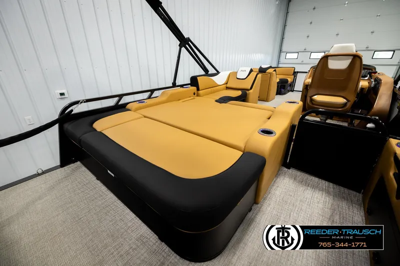 Slide: The Image of 2026 Avalon LSZ VRB boat interior with luxurious tan seating and modern design. - 25