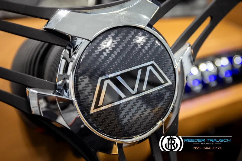 Slide: The Image of Close-up of 2026 Avalon LSZ VRB steering wheel with carbon fiber design. - 35