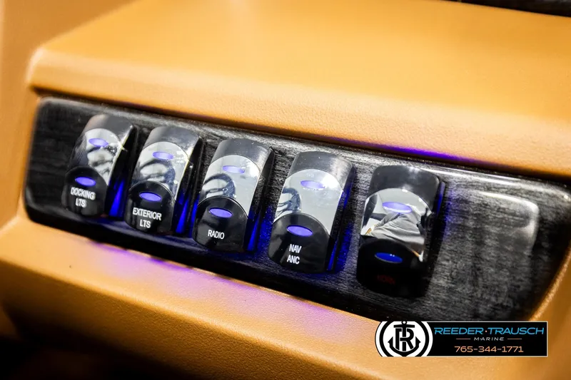 Slide: The Image of Control panel of 2026 Avalon LSZ VRB with illuminated switches for various functions. - 40