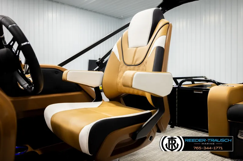 Slide: The Image of Luxurious captain's chair in 2026 Avalon LSZ VRB boat, featuring tan and white upholstery. - 43