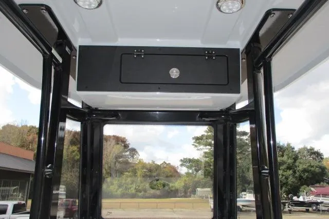 Slide: The Image of 2026 Blazer Bay MAKARIA 2600 boat interior with silver quilted seats and control panel. - 15