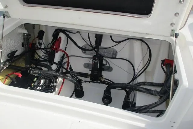 Slide: The Image of 2026 Blazer Bay MAKARIA 2600 boat interior with rod holders and storage compartments. - 18