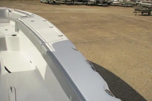 Slide: The Image of 2026 Blazer Bay MAKARIA 2600 boat storage compartment, open lid, white interior. - 23