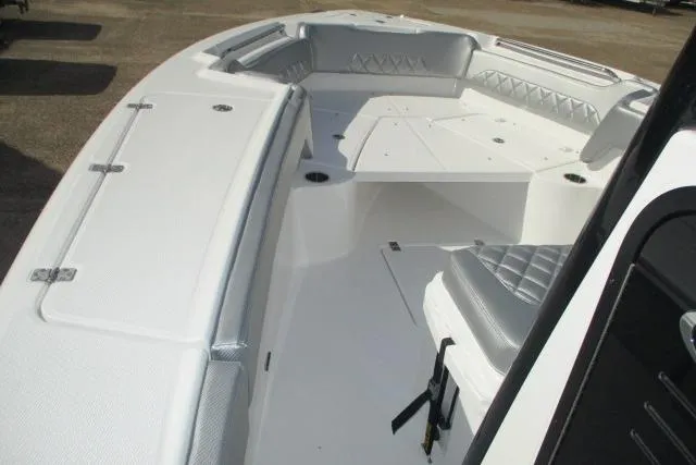 Slide: The Image of 2026 Blazer Bay MAKARIA 2600 boat deck, white interior, outdoor display. - 24