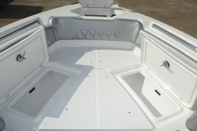 Slide: The Image of 2026 Blazer Bay MAKARIA 2600 boat storage compartment with open hatch and visible wiring. - 27