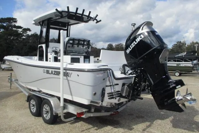 Slide: The Image of 2026 Blazer Bay MAKARIA 2600 boat interior with cushioned seating and storage. - 36