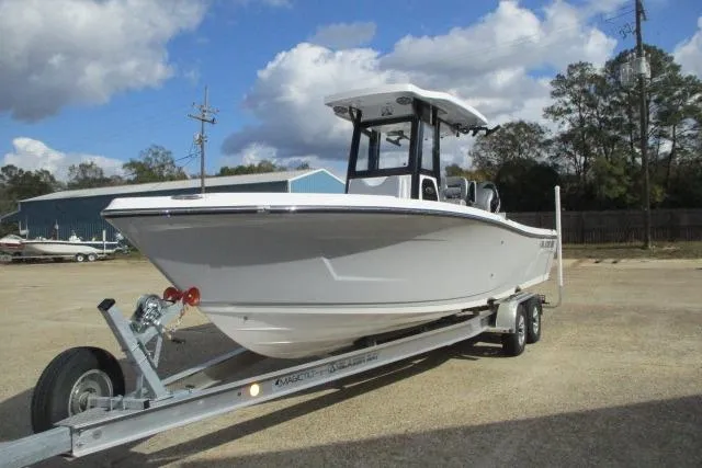 Slide: The Image of 2026 Blazer Bay MAKARIA 2600 boat under a partly cloudy sky. - 4