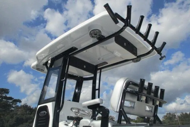 Slide: The Image of 2026 Blazer Bay MAKARIA 2600 boat with sleek T-top design against a blue sky. - 6