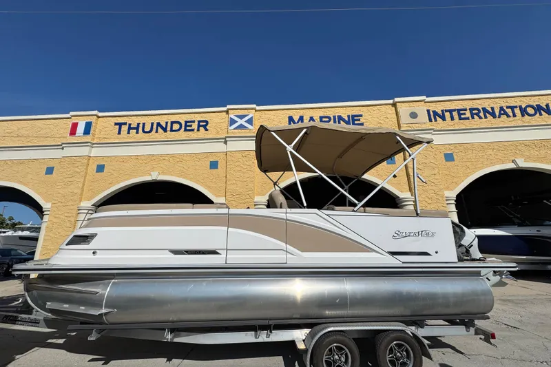 Slide: The Image of 2022 Blue Wave Pontoon boat at Thunder Marine International dealership. - 0