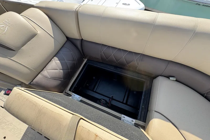 Slide: The Image of 2022 Blue Wave Pontoon boat interior with luxurious beige seating and modern design. - 8