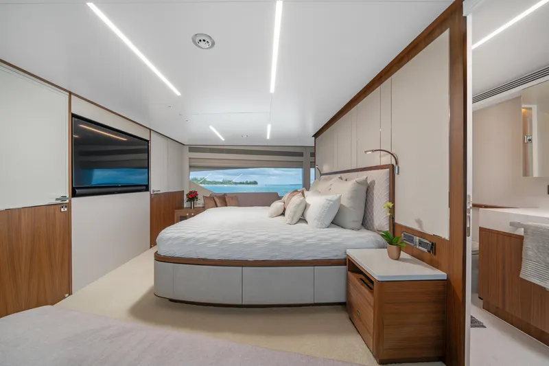 Slide: The Image of Luxurious bedroom interior of 2023 Horizon FD90 yacht with modern design and ocean view. - 15
