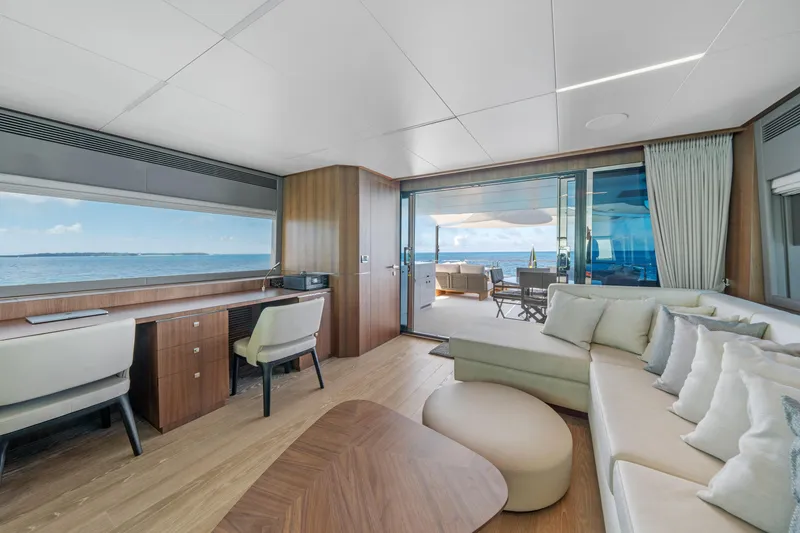 Slide: The Image of Luxurious interior of 2023 Horizon FD90 yacht with ocean view and elegant furnishings. - 25