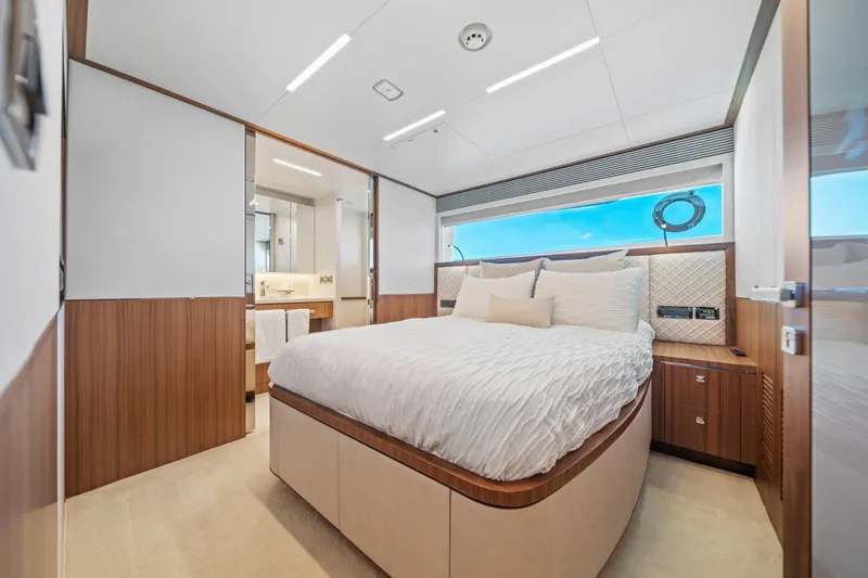 Slide: The Image of Luxurious bedroom interior on 2023 Horizon FD90 yacht with modern design and ocean view. - 22