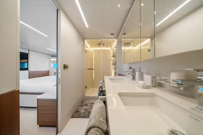 Slide: The Image of Luxurious bathroom in 2023 Horizon FD90 yacht with modern fixtures and elegant design. - 17