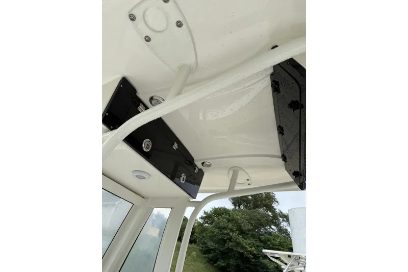 Slide: The Image of 2026 Key West 239 FS boat seats with diamond stitching and armrests. - 5