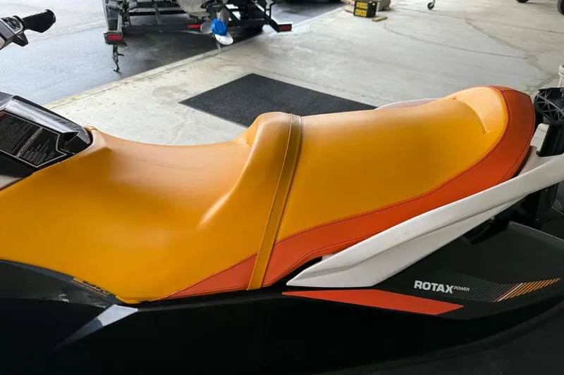 Slide: The Image of 2018 Seadoo GTI SE 155 jet ski with orange and yellow seat, Rotax engine. - 6