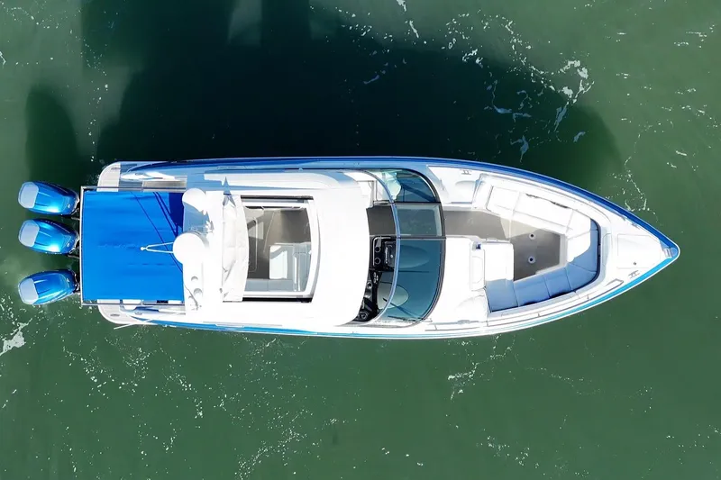 Slide: The Image of Overhead view of 2019 Formula 350 Crossover Bowrider OB on water. - 29