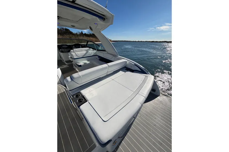 Slide: The Image of 2019 Formula 350 Crossover Bowrider OB on water, featuring spacious seating and sleek design. - 36