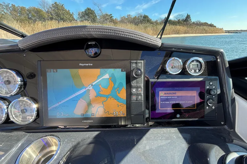 Slide: The Image of Dashboard of 2019 Formula 350 Crossover Bowrider OB with navigation and warning displays. - 51