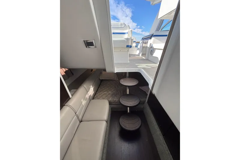 Slide: The Image of 2019 Formula 350 Crossover Bowrider OB interior with seating and steps to deck. - 65