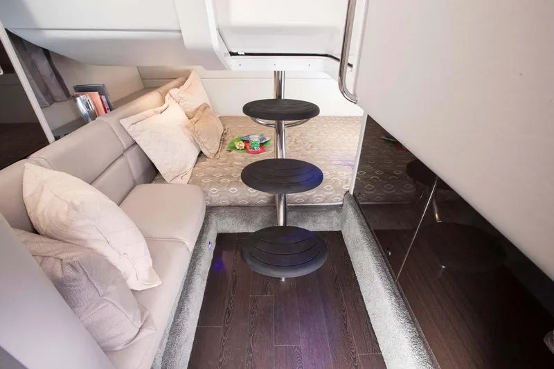 Slide: The Image of Manufacturer Provided Image: Interior of 2019 Formula 350 Crossover Bowrider OB with modern seating and spiral staircase. - 66