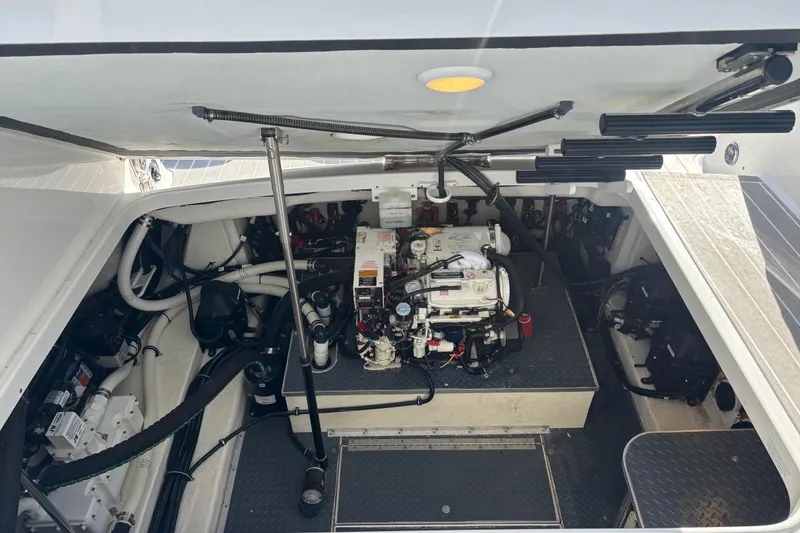 Slide: The Image of 2019 Formula 350 Crossover Bowrider OB engine compartment, showcasing detailed mechanical components. - 75