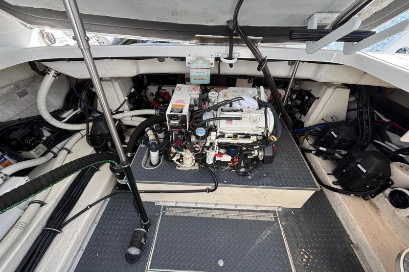 Slide: The Image of Engine compartment of a 2019 Formula 350 Crossover Bowrider OB boat. - 77