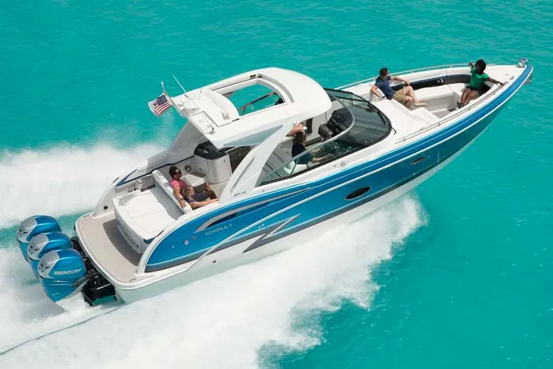 Slide: The Image of Manufacturer Provided Image: 2019 Formula 350 Crossover Bowrider OB cruising on turquoise water. - 84